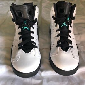Air Jordan’s- white w/teal logo